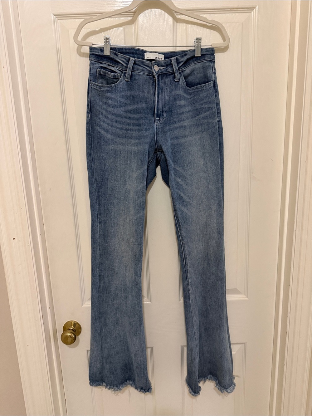 High-Rise Light Blue Flare Jeans with Raw Hem